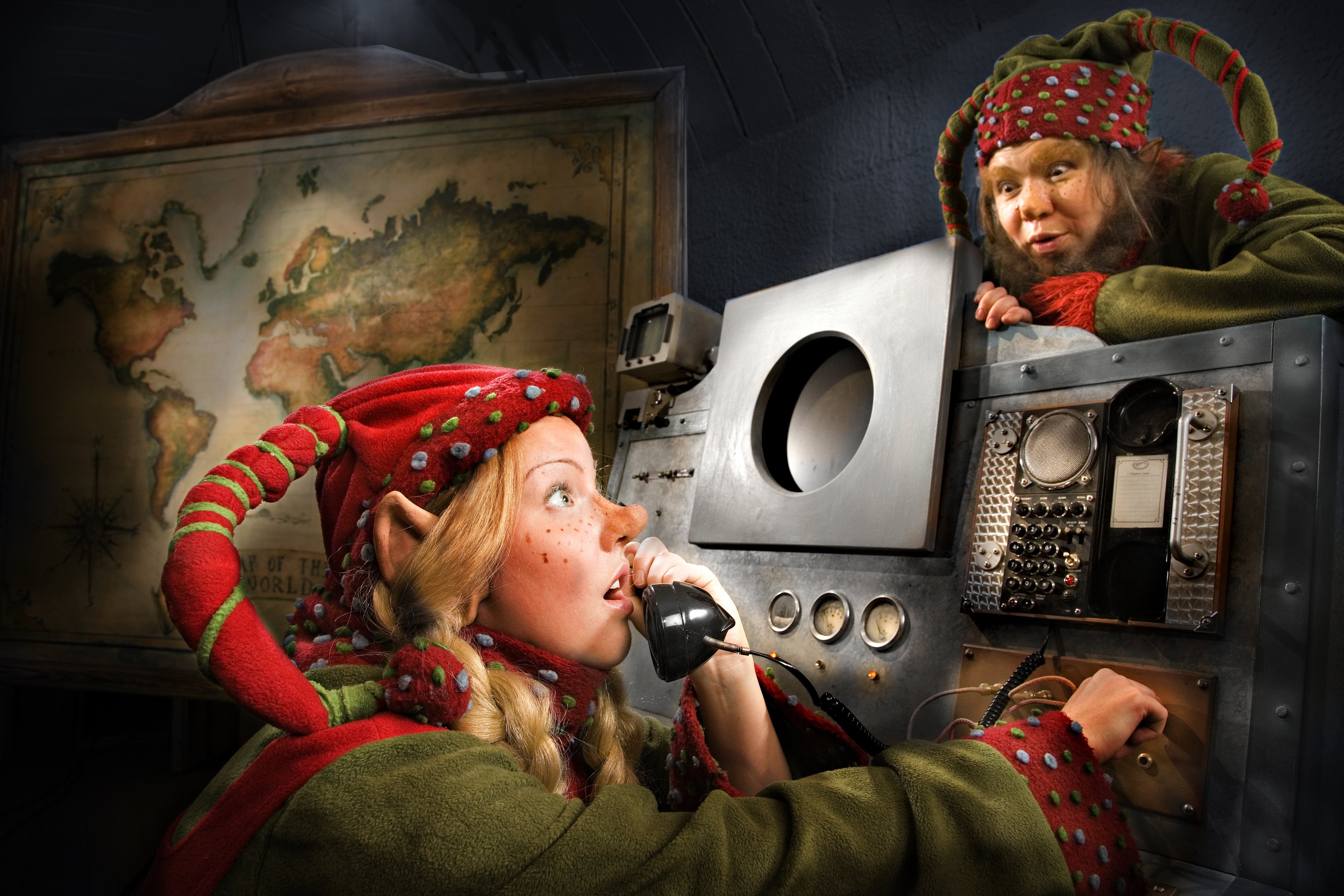 Elves in Christmas Command Center in Santa Claus Secret Forest Lapland